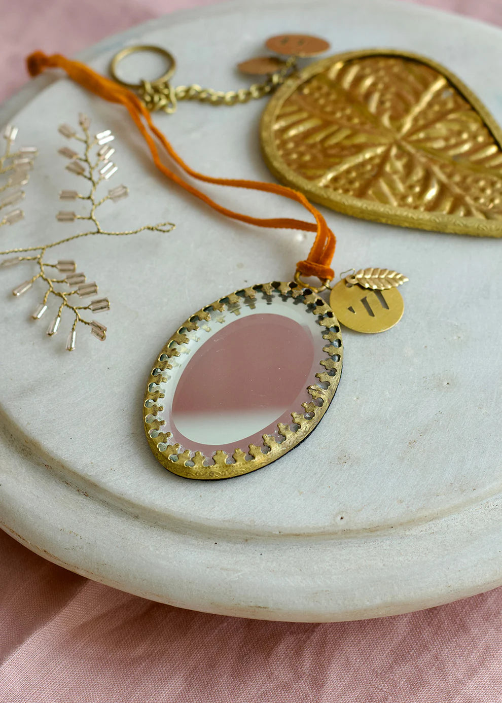 Oval mirror ornament